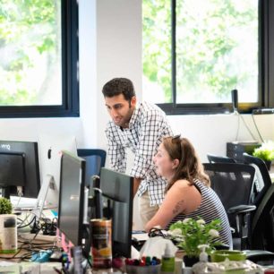 Employees discussing solutions